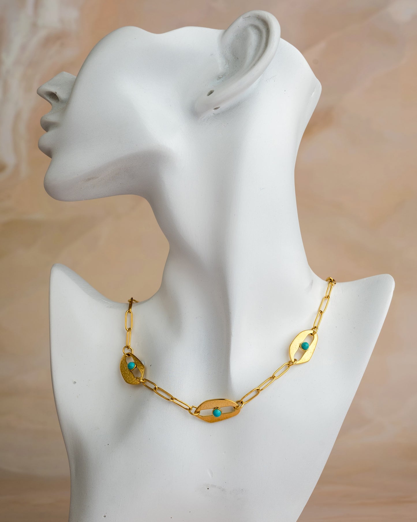 Blue Stone in Gold Shell