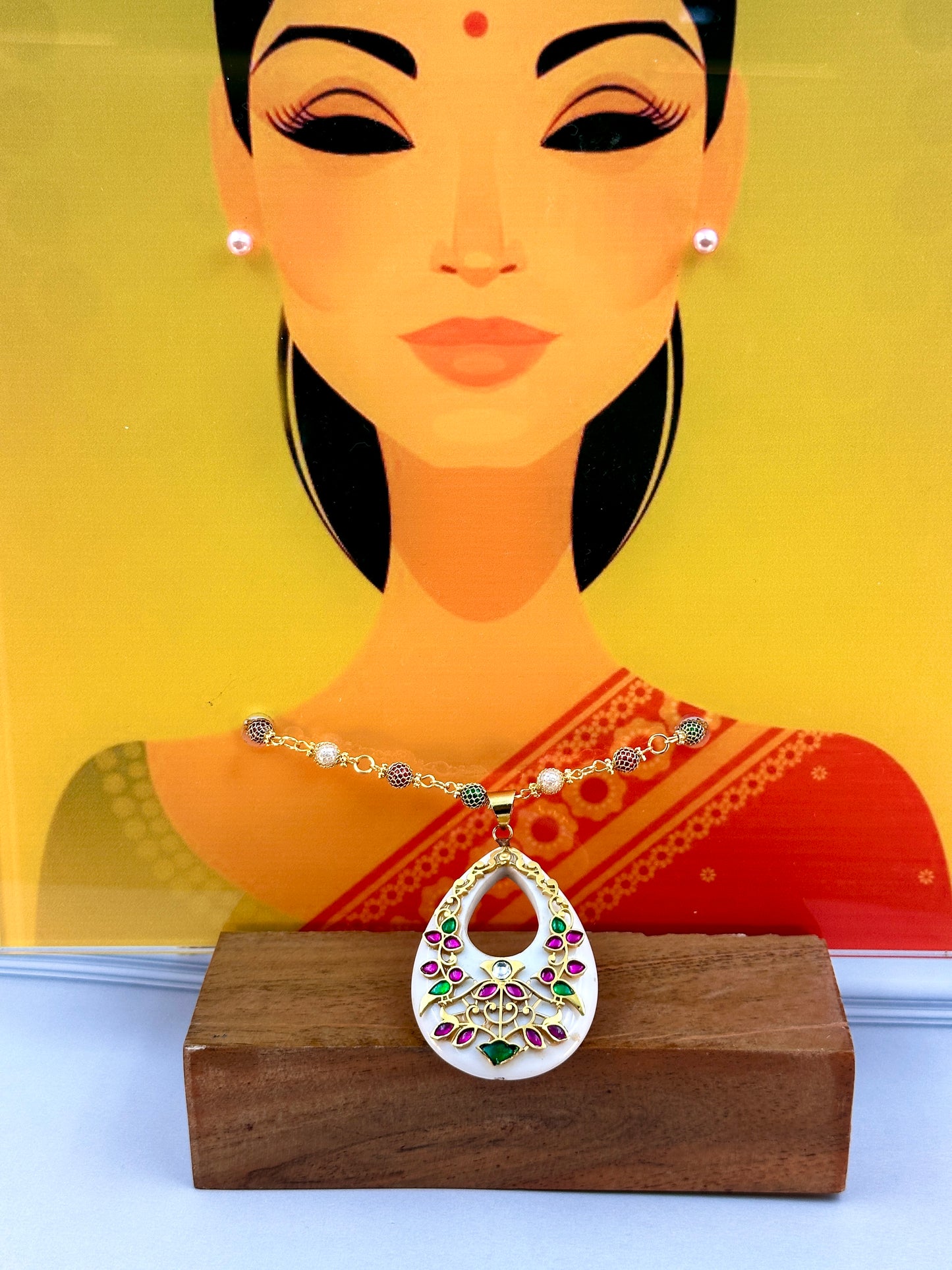 Big White Oval Shaped Pendant With Gold Work