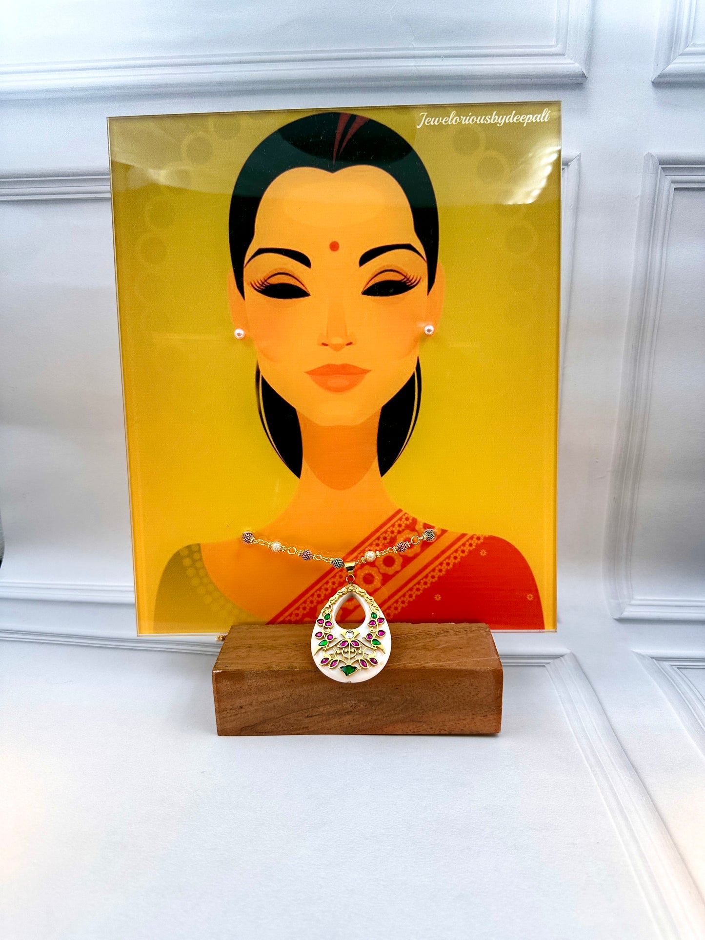 Big White Oval Shaped Pendant With Gold Work
