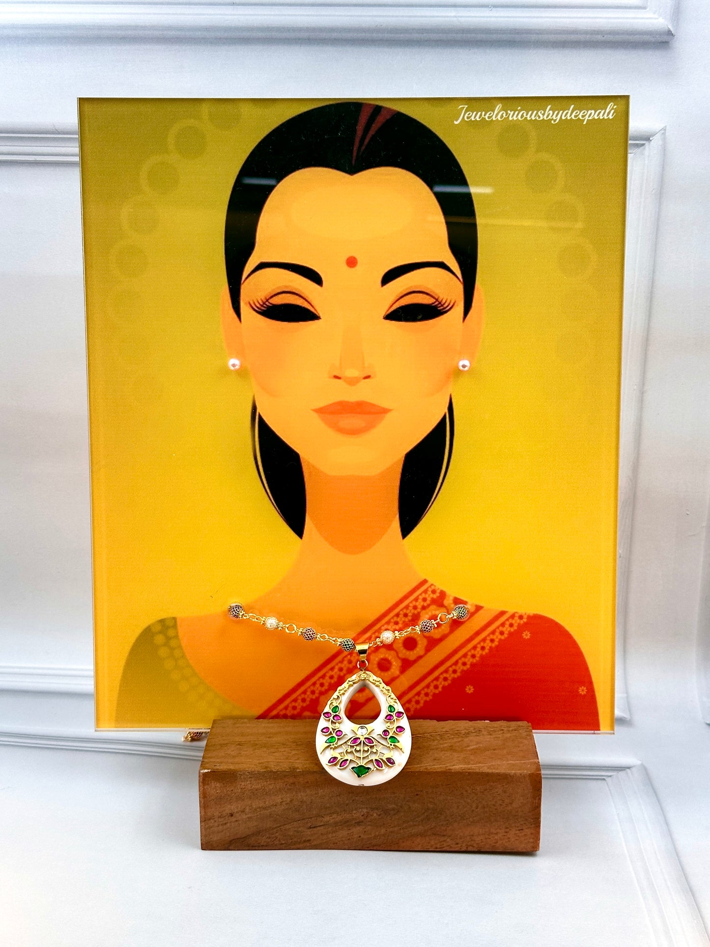 Big White Oval Shaped Pendant With Gold Work