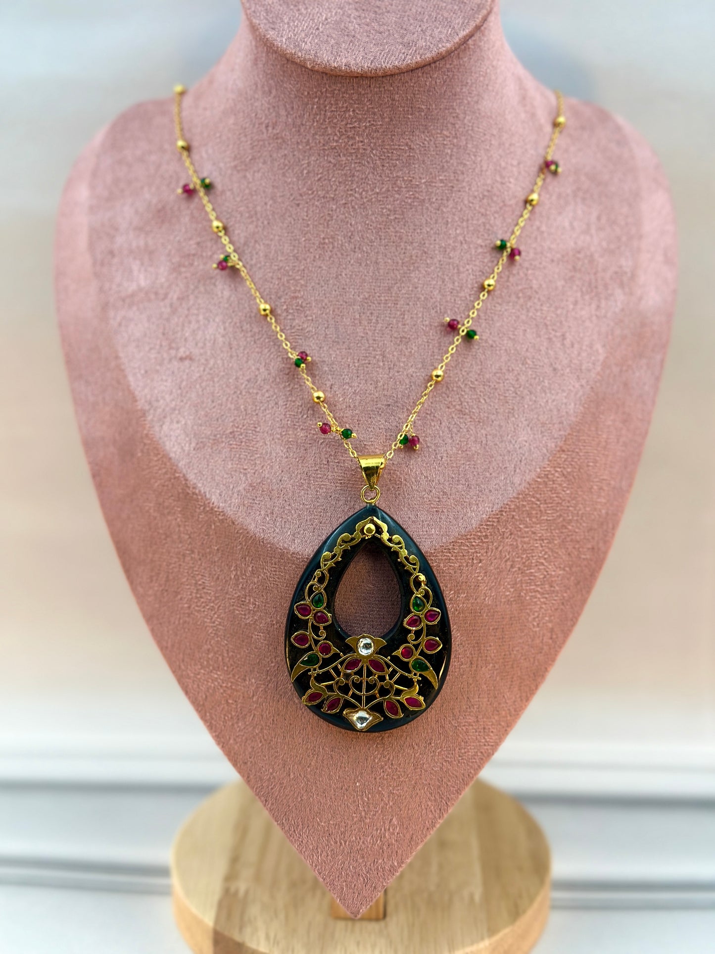 Big Black Oval Shaped Pendant With Gold Work