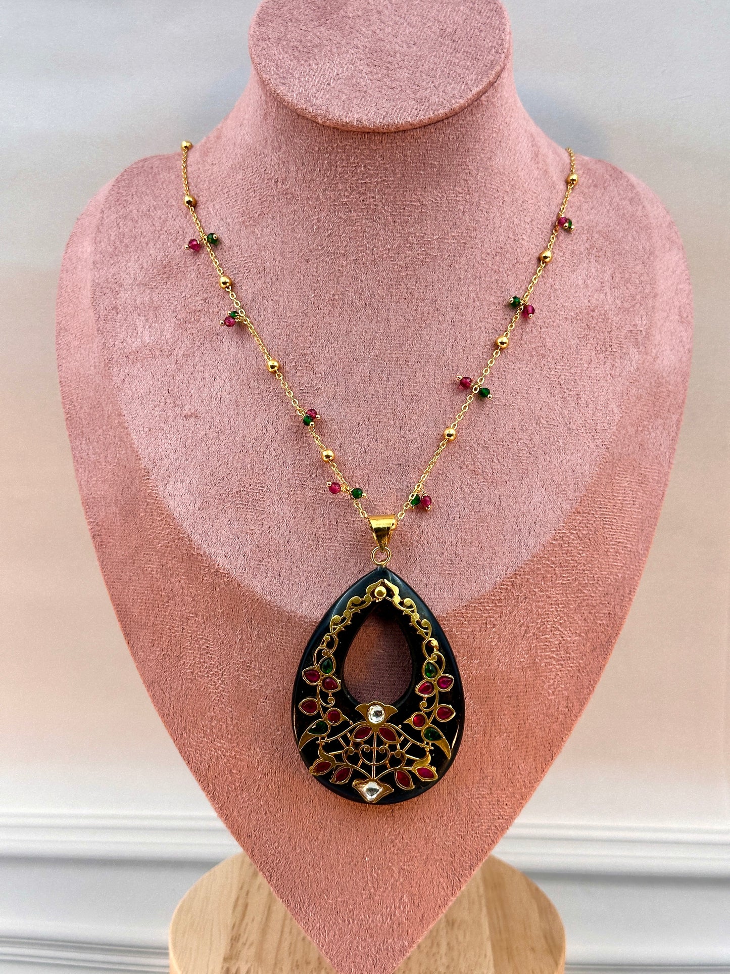Big Black Oval Shaped Pendant With Gold Work