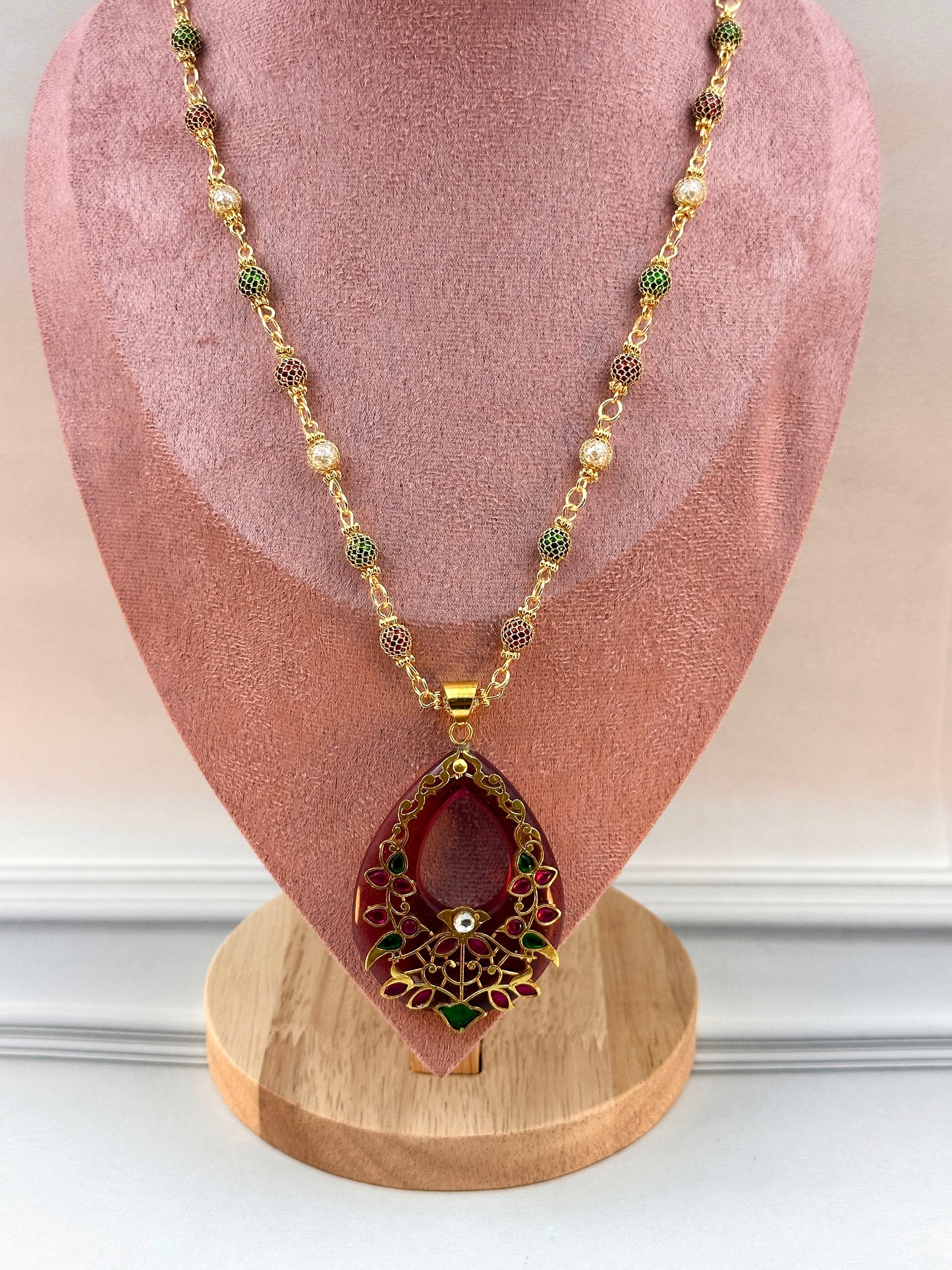 Big Maroon Oval Shaped Pendant With Gold Work
