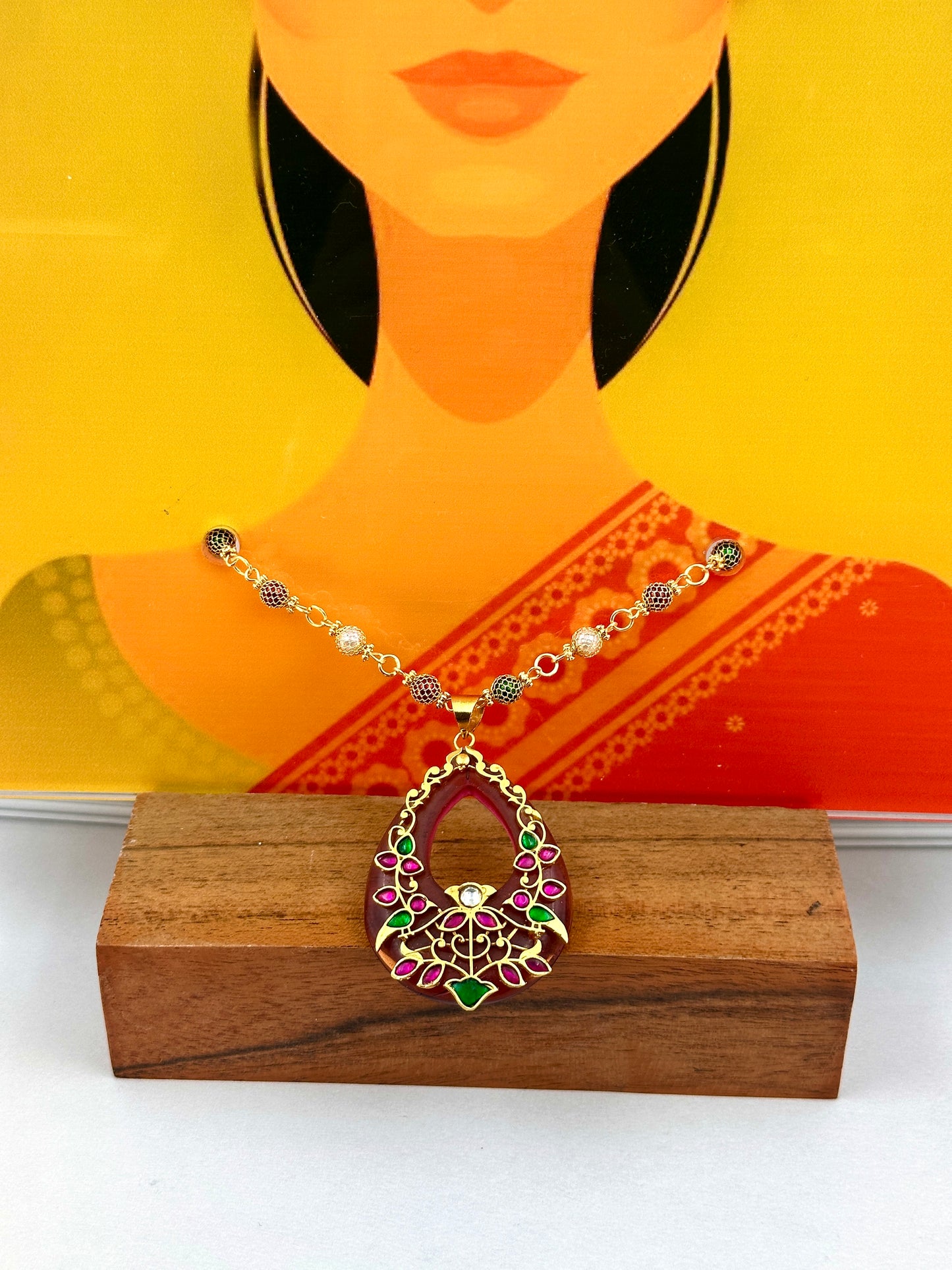 Big Maroon Oval Shaped Pendant With Gold Work
